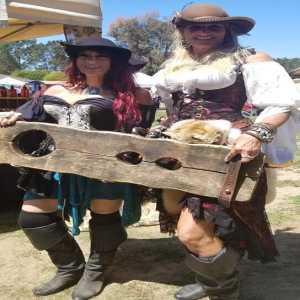 two girls with wood