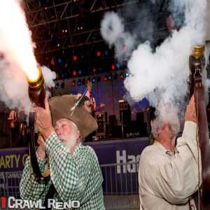 two guys shooting fat guns