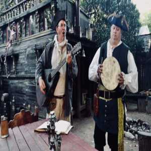 guys sing in front of boat