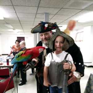 The Captain and a child.