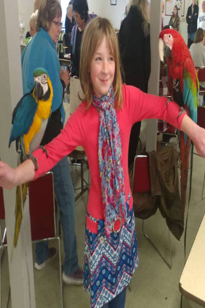 girl in pin with both birds